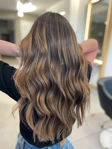 Long brunette waves at Venera Hair, Hampstead